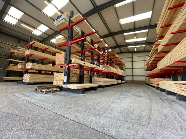 Conventional Cantilever Racking which has been set up and installed by Stakapal in a warehouse and is storing long products such as timber.